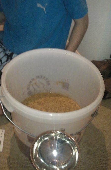 Co-founder of Renegade and Longton Brendan Thomson with the first fermentation of elderflower wine in a fermenting bucket