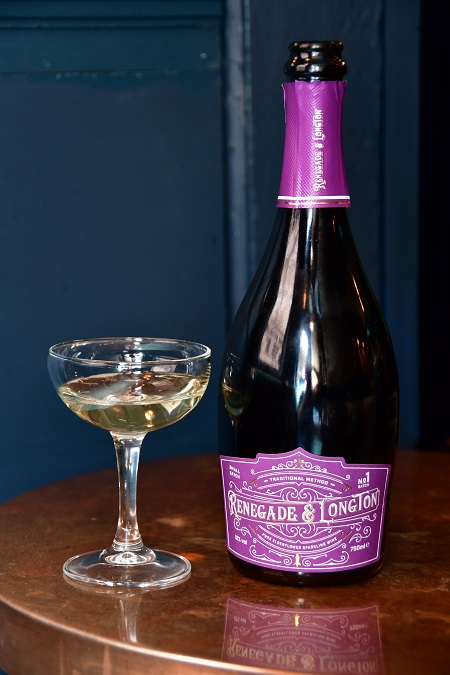Bottle of Renegade and Longton elderflower sparkling wine with coupe glass